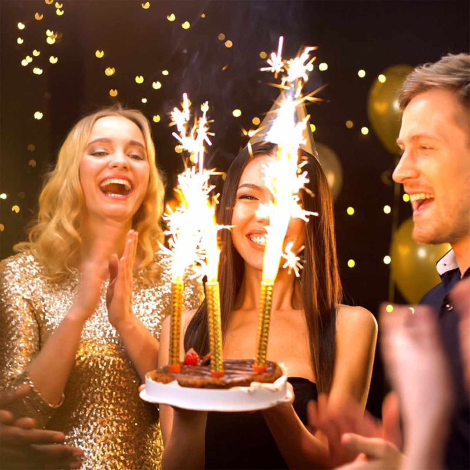 Multiple sparkler candles on birthday cake